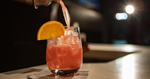 Pouring Pink Drink at Bar